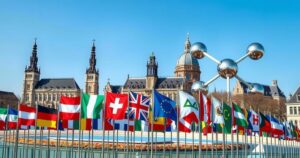 Brussels skyline during an international meeting focused on Afghanistan with flags and iconic architecture.
