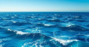 A panoramic view of deep blue ocean waves under a clear sky, representing exploration potential in Africa.