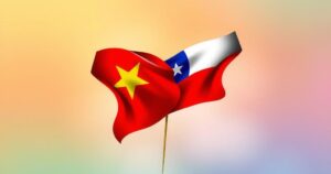 Stylish Vietnamese and Chilean flags intertwined, symbolizing diplomatic relations, against a bright gradient background.